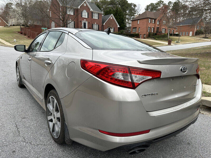 2013 Kia Optima for sale at SHURE AUTO SALES in Snellville, GA