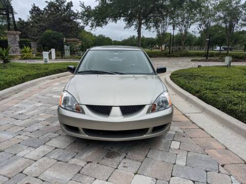 2004 Mitsubishi Lancer for sale at M&M and Sons Auto Sales in Lutz FL