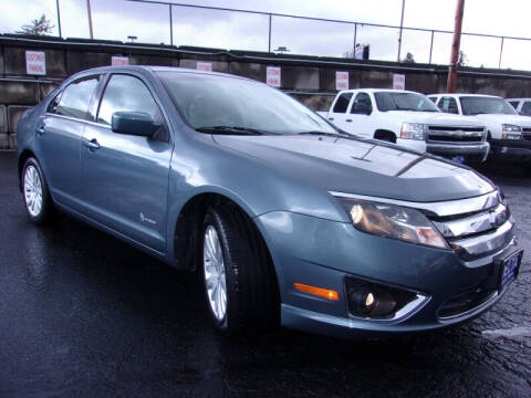 2012 Ford Fusion Hybrid for sale at Delta Auto Sales in Milwaukie OR