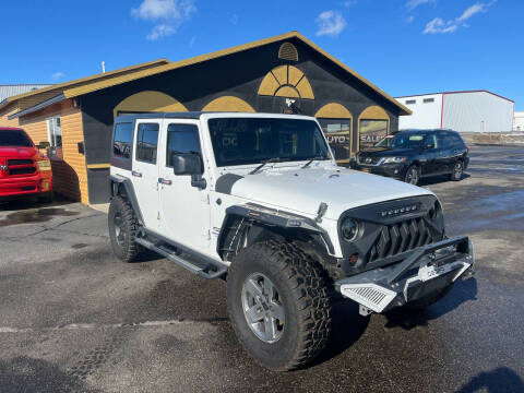 2013 Jeep Wrangler Unlimited for sale at BELOW BOOK AUTO SALES in Idaho Falls ID