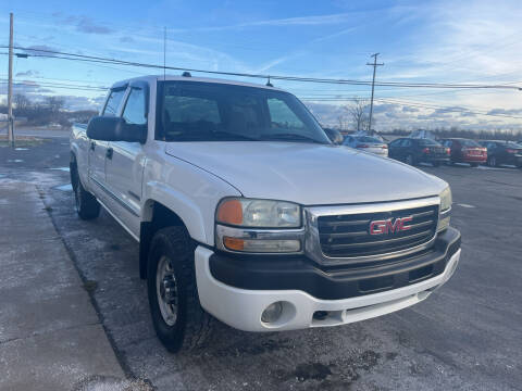 2004 GMC Sierra 2500 for sale at HEDGES USED CARS in Carleton MI