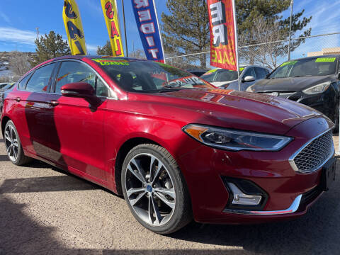 2019 Ford Fusion for sale at Duke City Auto LLC in Gallup NM