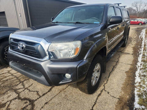 2014 Toyota Tacoma for sale at TIM'S AUTO SOURCING LIMITED in Tallmadge OH