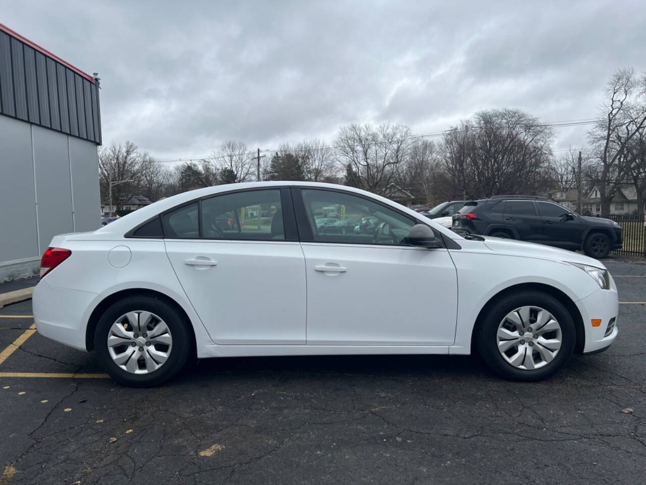 2014 Chevrolet Cruze for sale at Carventure in Lansing, MI