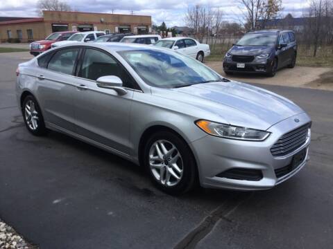 2016 Ford Fusion for sale at Bruns & Sons Auto in Plover WI