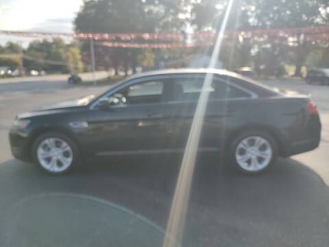 2015 Ford Taurus for sale at Kenny's Auto Sales Inc. in Lowell NC