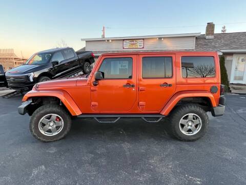 2011 Jeep Wrangler Unlimited for sale at Revolution Motors LLC in Wentzville MO