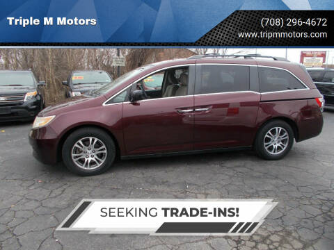 2012 Honda Odyssey for sale at Triple M Motors in Saint John IN