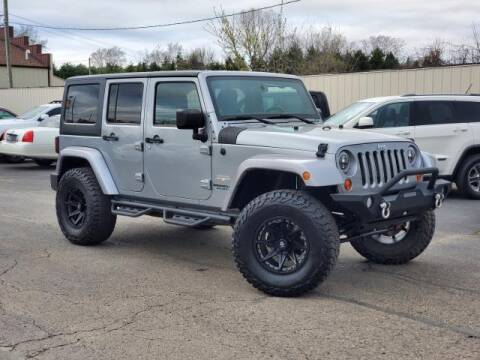 2013 Jeep Wrangler Unlimited for sale at Miller Auto Sales in Saint Louis MI