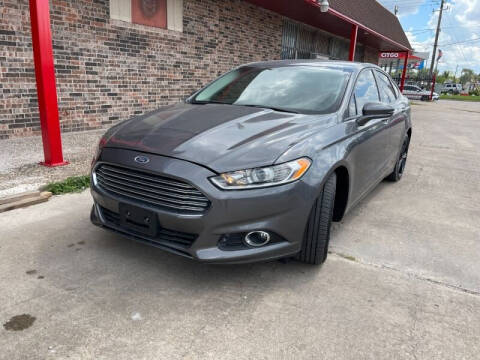 2016 Ford Fusion for sale at Sam's Auto Sales in Houston TX