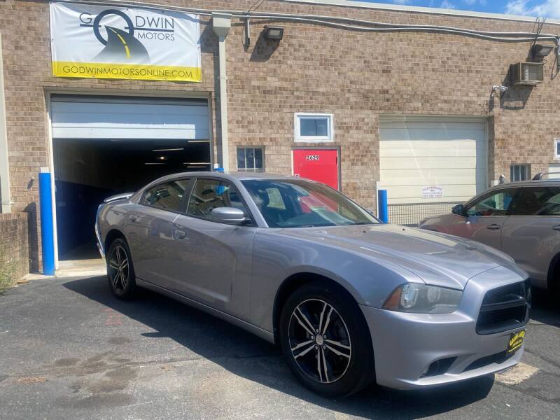 2014 Dodge Charger for sale at Godwin Motors INC in Silver Spring MD