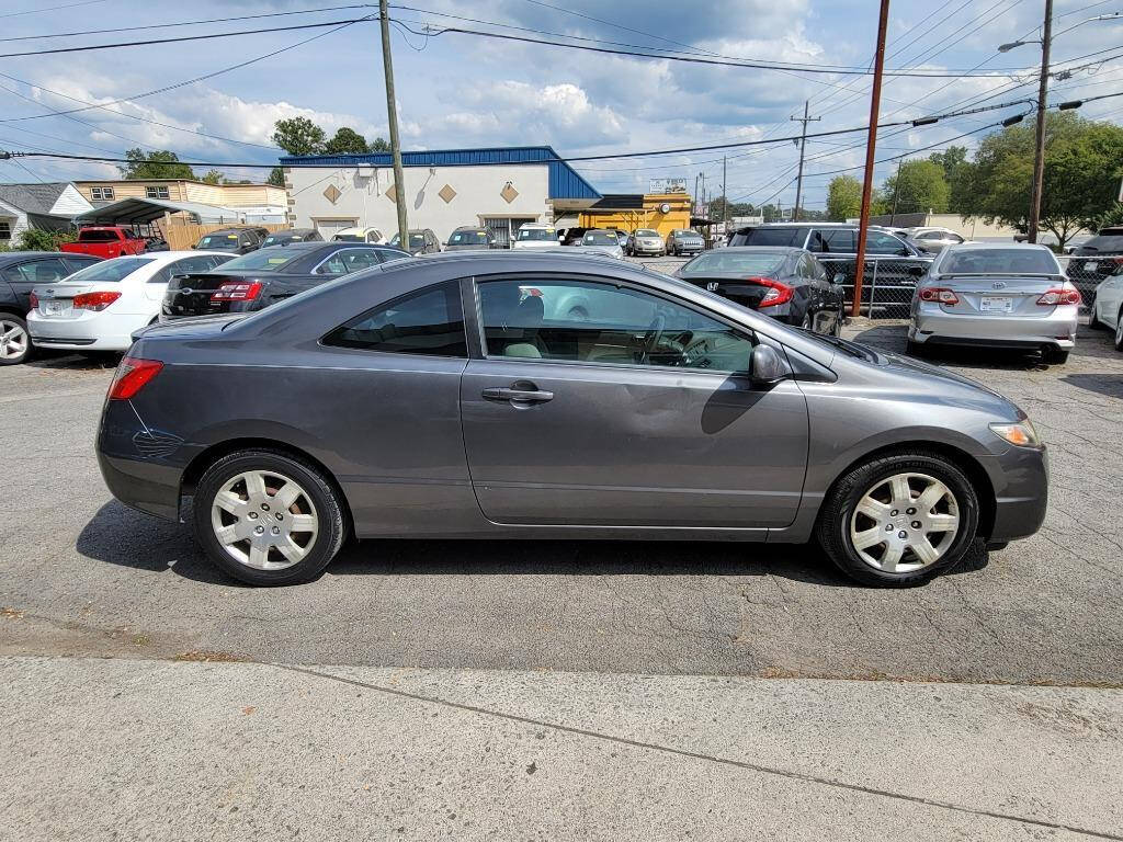 2011 Honda Civic for sale at DAGO'S AUTO SALES LLC in Dalton, GA