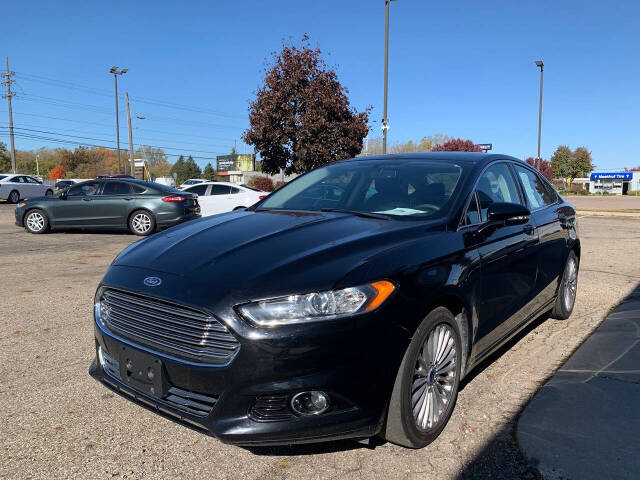 2016 Ford Fusion for sale at Cars On Demand LLC in Lansing, MI