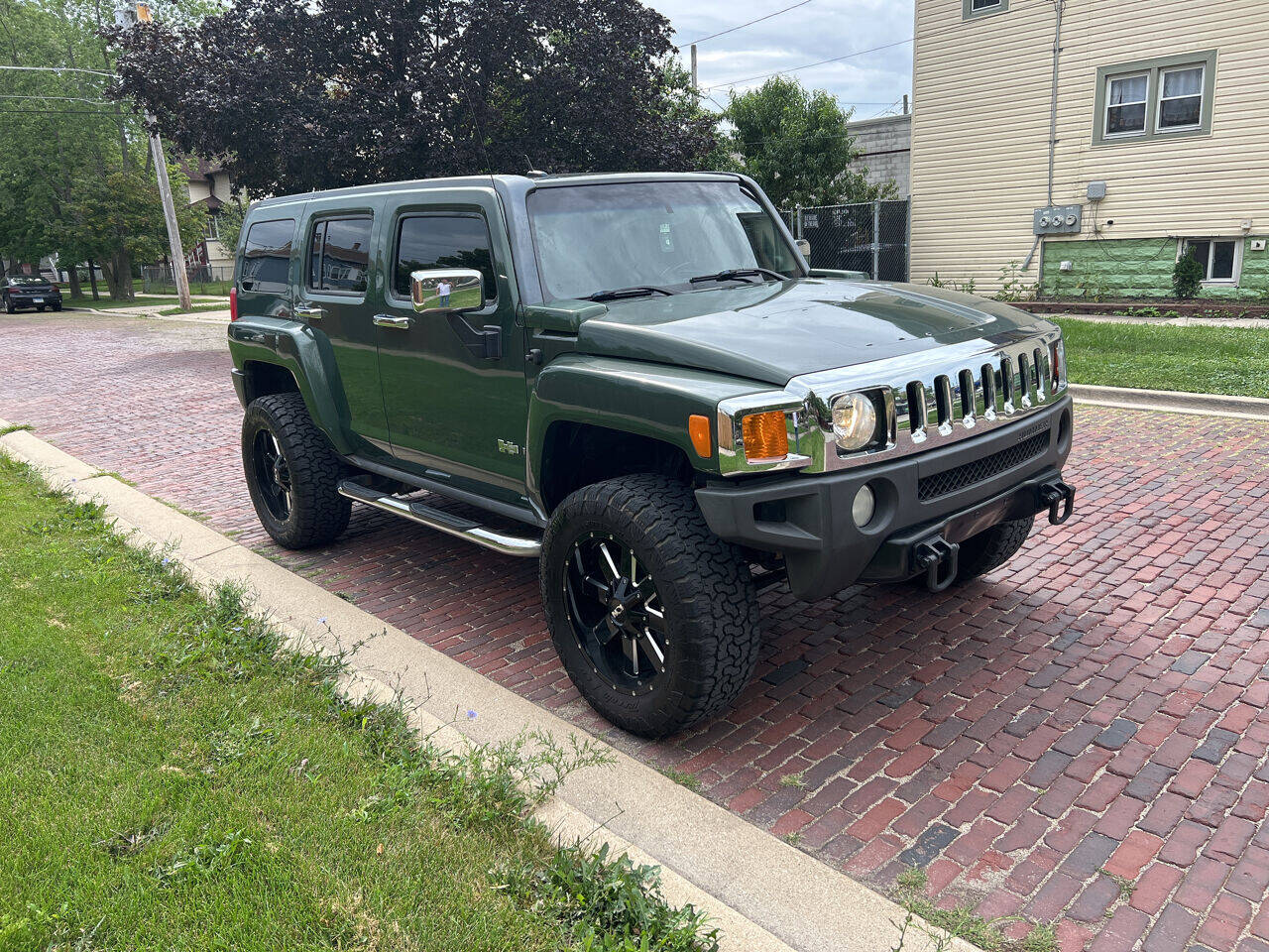 Hummer H3 Yellow Lifted