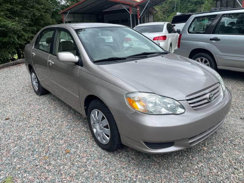 2003 Toyota Corolla for sale at R C MOTORS in Vilas NC