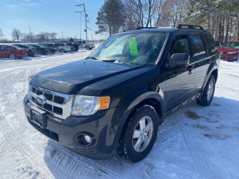 2011 Ford Escape for sale at Northwoods Auto & Truck Sales in Machesney Park IL
