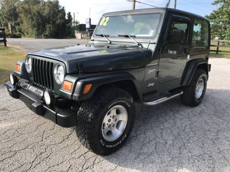 2002 Jeep Wrangler for sale at The Truck Barn in Ocala FL