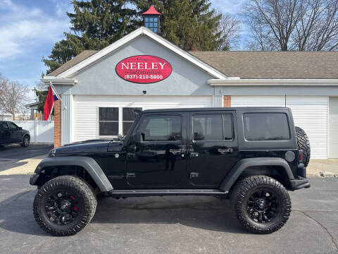 2013 Jeep Wrangler Unlimited for sale at Neeley Automotive in Bellefontaine OH