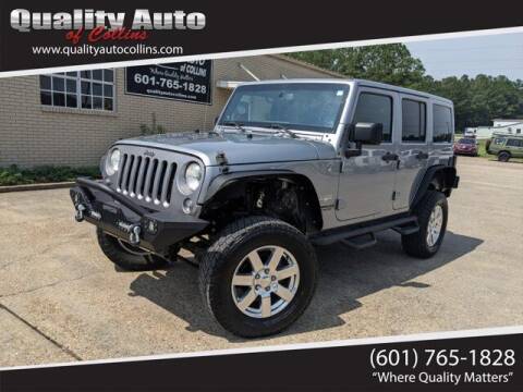 2014 Jeep Wrangler Unlimited for sale at Quality Auto of Collins in Collins MS