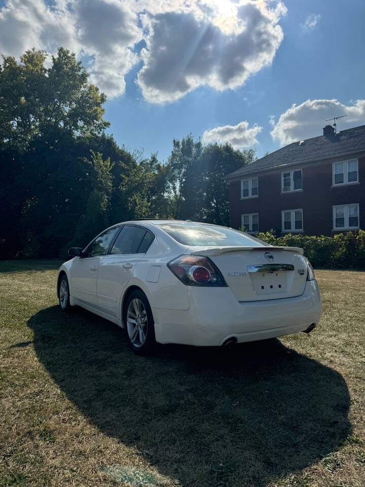 2012 Nissan Altima for sale at H & H AUTO GROUP in Detroit, MI