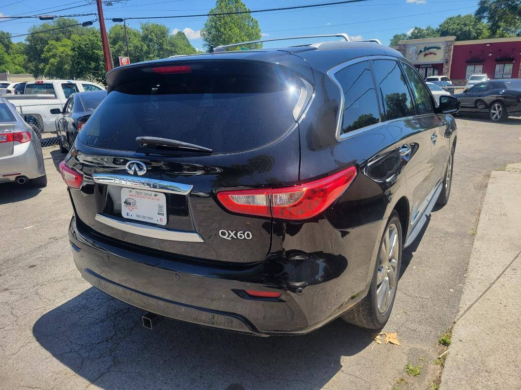 2014 INFINITI QX60 for sale at DAGO'S AUTO SALES LLC in Dalton, GA