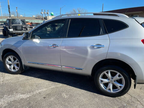2011 Nissan Rogue for sale at Gator's Auto Sales in Garland TX