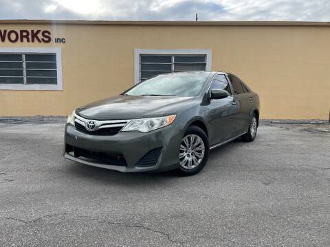 2012 Toyota Camry for sale at Vox Automotive in Oakland Park FL