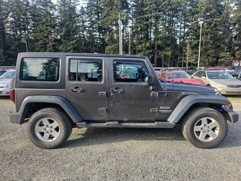 2014 Jeep Wrangler Unlimited for sale at MC AUTO LLC in Spanaway WA