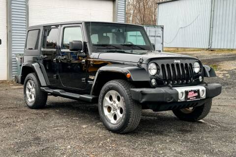 2015 Jeep Wrangler Unlimited for sale at John's Automotive in Pittsfield MA