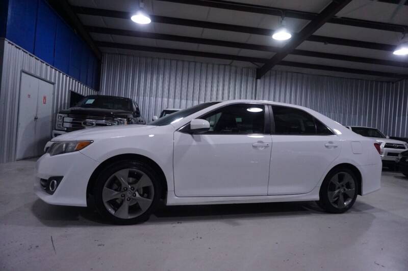 2014 Toyota Camry for sale at SOUTHWEST AUTO CENTER INC in Houston TX