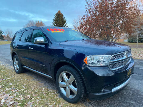 2012 Dodge Durango for sale at BELOW BOOK AUTO SALES in Idaho Falls ID