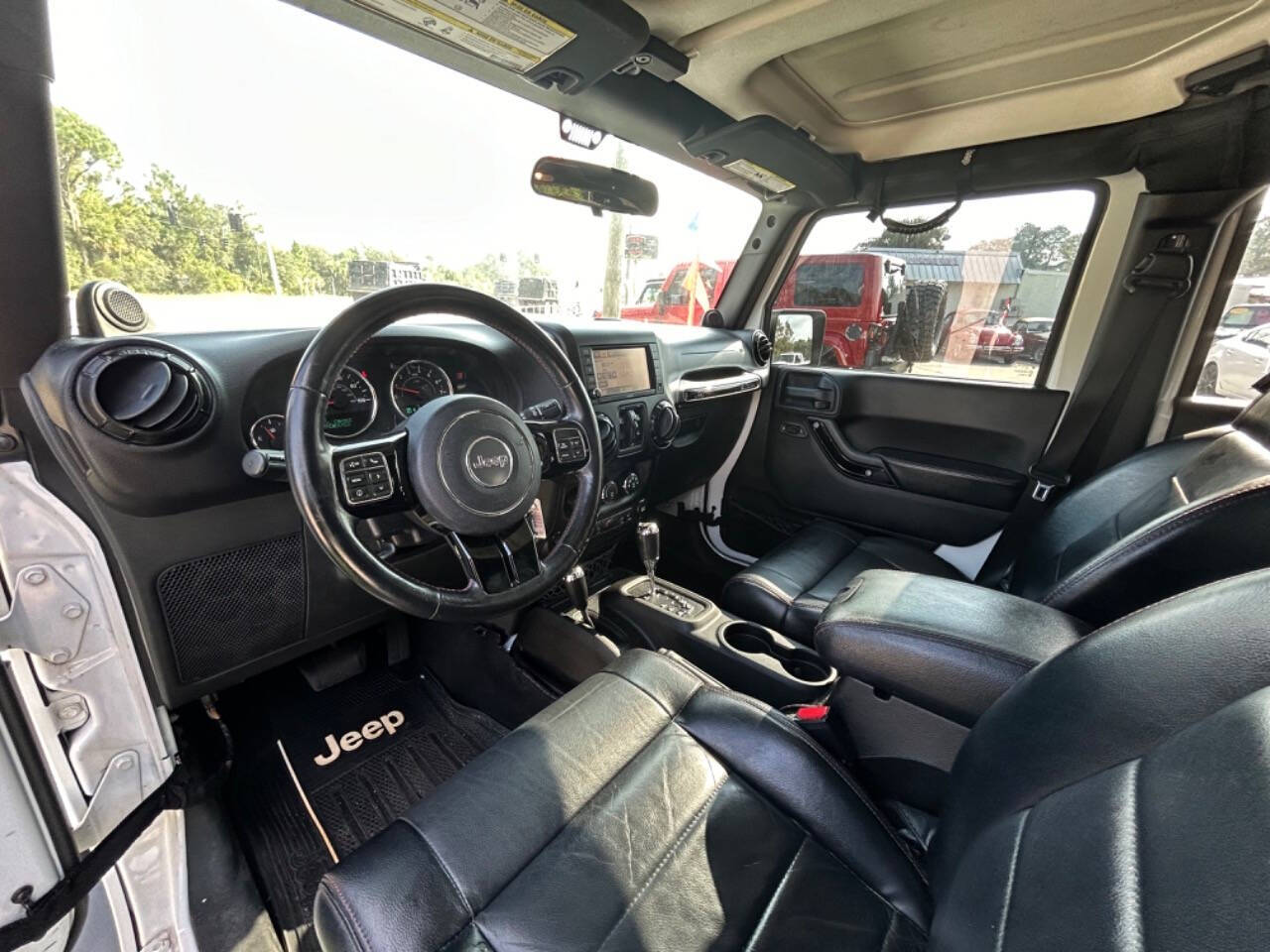 2012 Jeep Wrangler Unlimited for sale at VASS Automotive in DeLand, FL