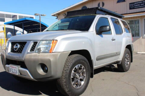 2014 Nissan Xterra for sale at Empire Motors in Acton CA