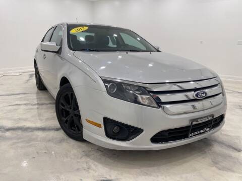 2012 Ford Fusion for sale at Auto House of Bloomington in Bloomington IL