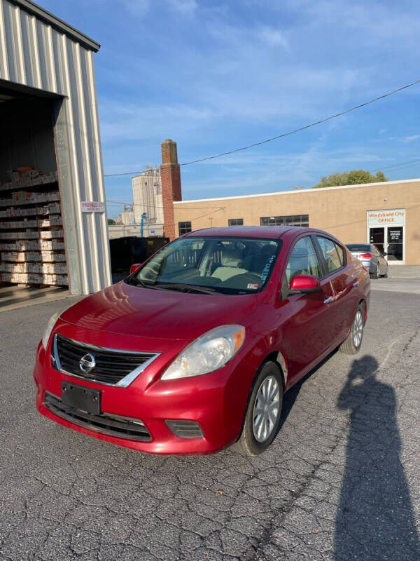 2012 Nissan Versa for sale at Village Auto Center INC in Harrisonburg VA