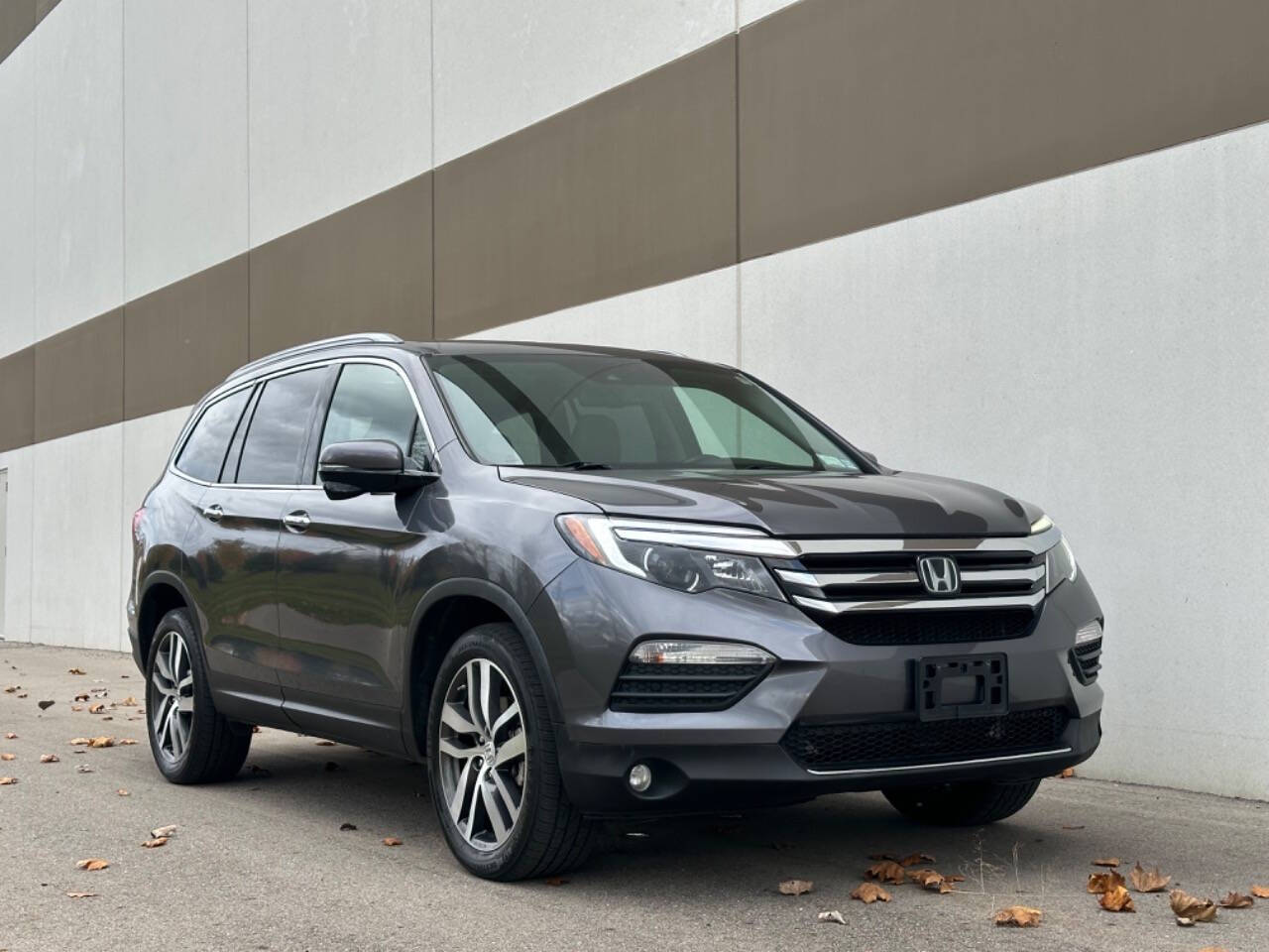 2017 Honda Pilot for sale at Phoenix Motor Co in Romulus, MI