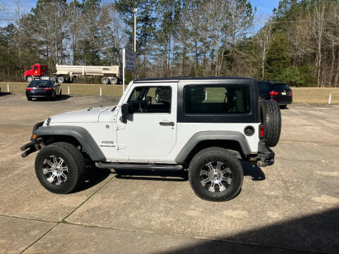 2012 Jeep Wrangler for sale at ALLEN JONES USED CARS INC in Steens MS