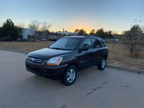 2006 Kia Sportage for sale at QUEST MOTORS in Englewood CO