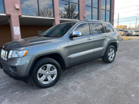 2012 Jeep Grand Cherokee for sale at AROUND THE WORLD AUTO SALES in Denver CO