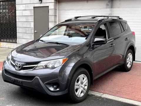 2014 Toyota RAV4 for sale at King Of Kings Used Cars in North Bergen NJ