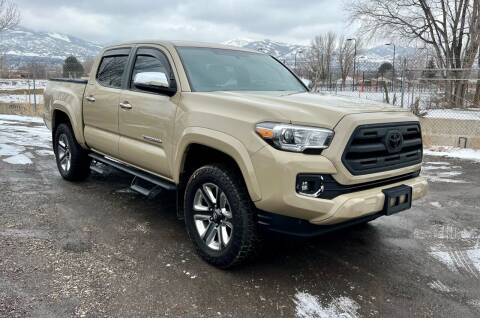 2017 Toyota Tacoma for sale at The Car-Mart in Murray UT