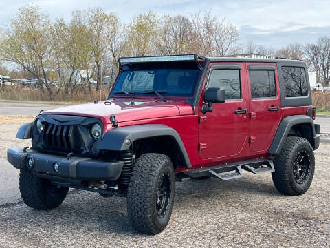 2011 Jeep Wrangler Unlimited for sale at Direct Auto Sales LLC in Osseo MN