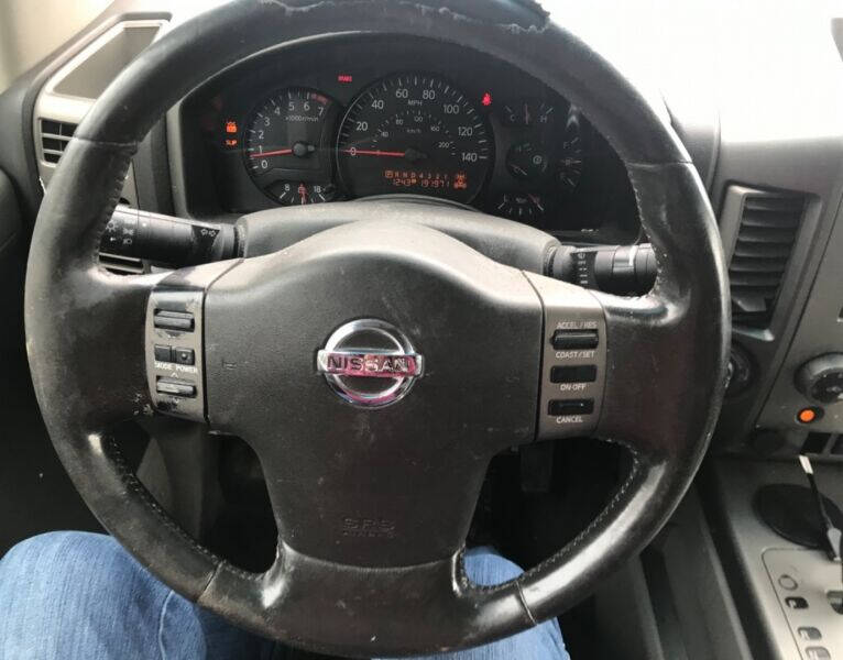 2004 Nissan Titan for sale at Bob and Jill's Drive and Buy in Bemidji, MN