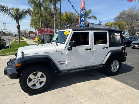 2013 Jeep Wrangler Unlimited for sale at Dealers Choice Inc in Farmersville CA