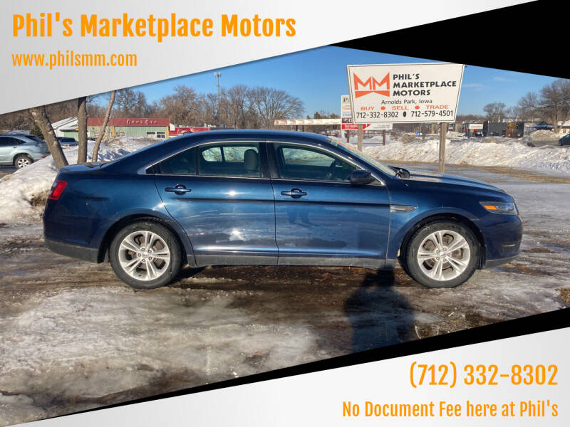 2017 Ford Taurus for sale at Phil's Marketplace Motors in Arnolds Park IA