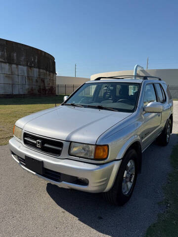 1999 Honda Passport for sale at Canales Auto Deals LLC in Galveston TX