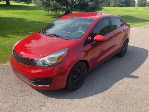 2015 Kia Rio for sale at BELOW BOOK AUTO SALES in Idaho Falls ID