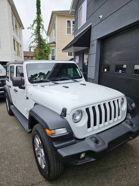 2019 Jeep Wrangler Unlimited for sale at RENOS AUTO SALES LLC in Waterbury, CT