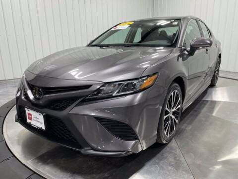 2019 Toyota Camry for sale at HILAND TOYOTA in Moline IL