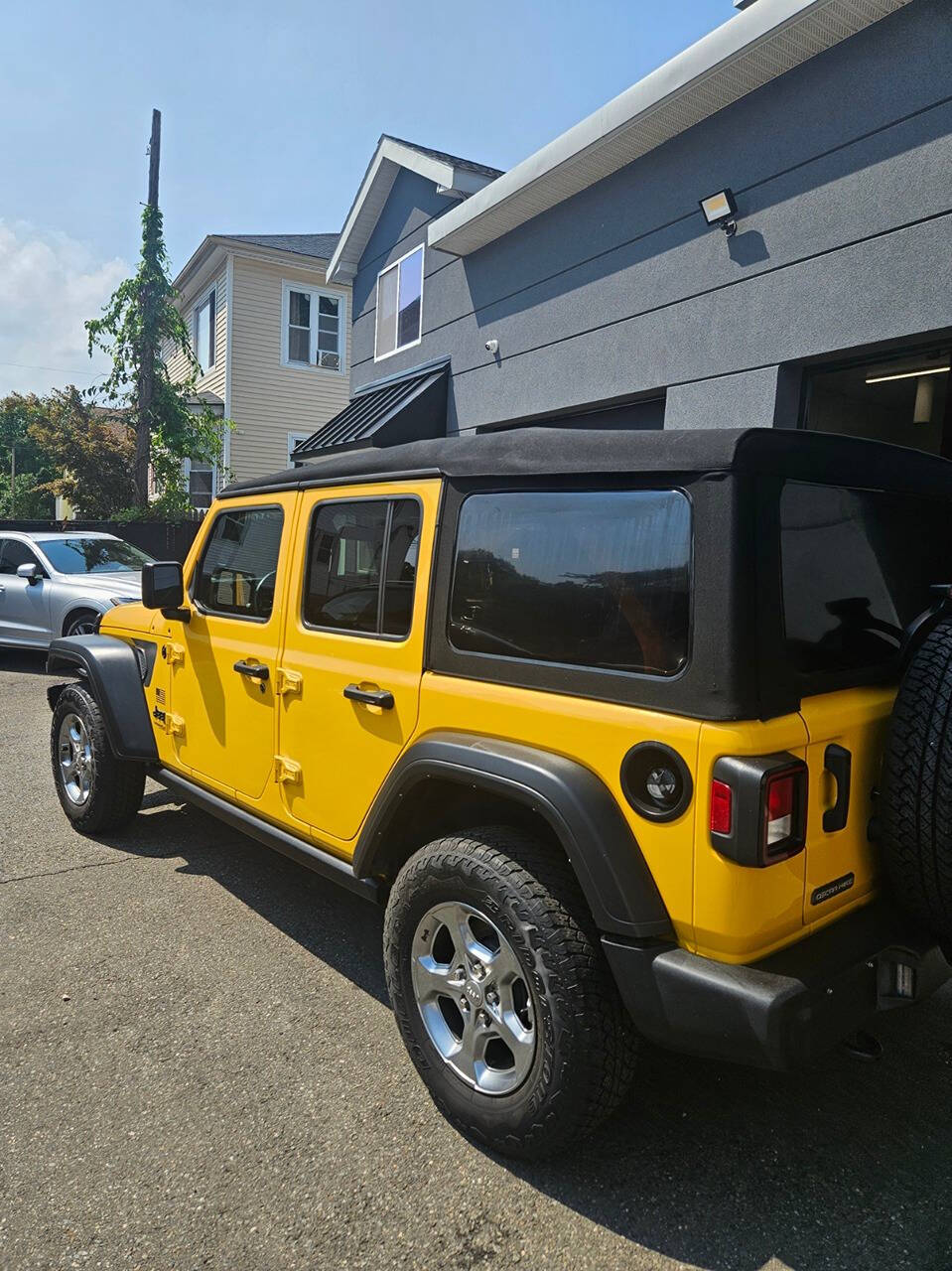 2021 Jeep Wrangler Unlimited for sale at RENOS AUTO SALES LLC in Waterbury, CT